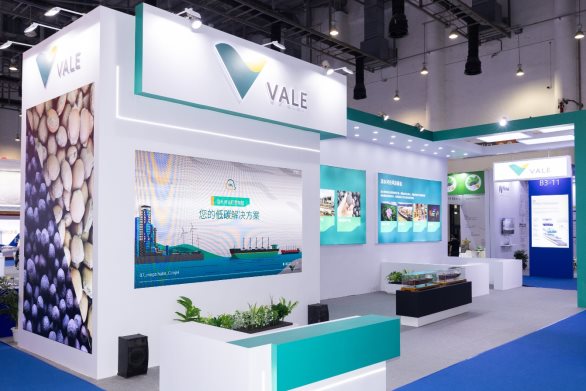 A white and blue booth with blue and green designs

Description automatically generated with medium confidence