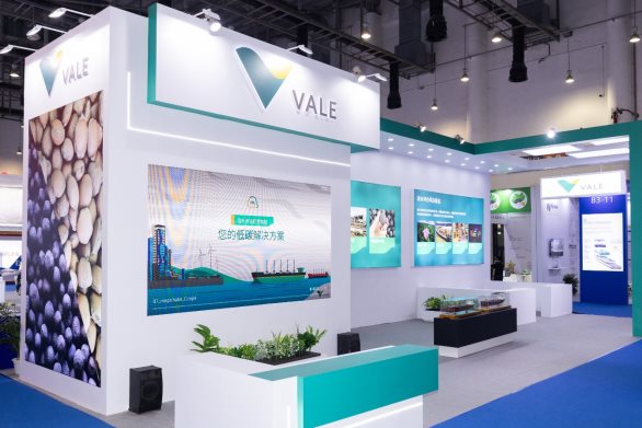 A white and blue booth with blue and green designs

Description automatically generated with medium confidence